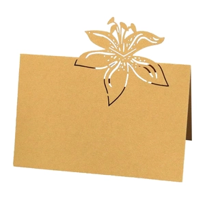 Rustic kraft paper place card with laser-cut lily flower design for table seating