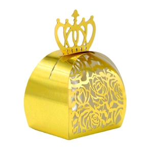 Golden crown hollow wedding candy box with laser-cut rose patterns on white background