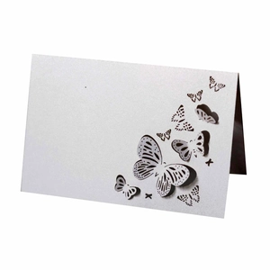 Detailed laser-cut butterfly hollow pattern on pearlescent paper table place card