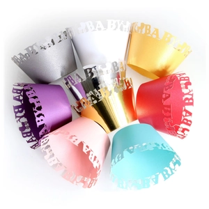 Laser-cut baby stroller cupcake wrappers in assorted metallic colors for baby showers