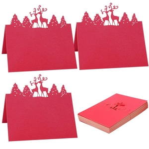 Laser cut red Christmas reindeer place cards made of premium kraft paper for table setting