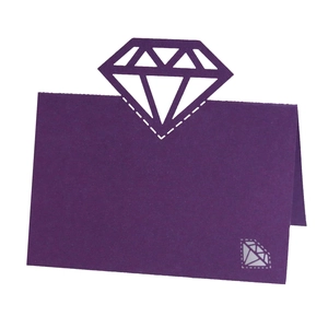 Detail view of purple laser-cut diamond-shaped place card with elegant folding stand