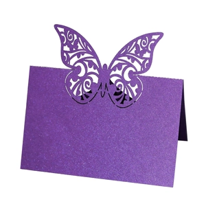 Purple glitter butterfly place card with laser-cut design for wedding table decor