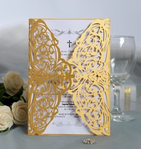 Intricate laser-cut gold butterfly invitation card with delicate hollow wing patterns