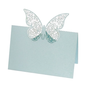 Detail of light blue laser cut butterfly card with hollow patterns and pearlescent finish