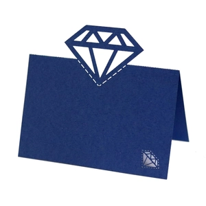 Detail of navy blue place card with diamond laser-cut top and silver diamond print
