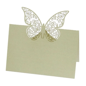 Detailed laser-cut hollow butterfly place card with champagne gold shimmer paper