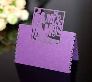 Laser-cut purple glitter Mr & Mrs wedding place cards with butterfly and silhouette detail