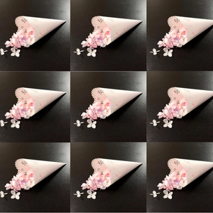White laser cut lace wedding flower petal cones with hollow rose patterns for party confetti