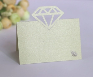 Macro shot of 3D laser-cut diamond placeholder card with elegant pearl shimmer finish