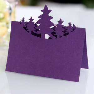 Elegant deep purple Christmas tree place card with intricate laser-cut hollow design