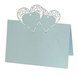Detailed laser-cut light blue hollow heart place card for weddings or formal banquets