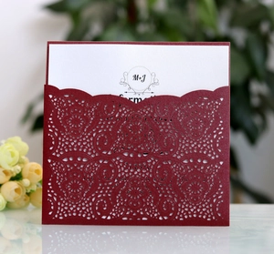 Elegant laser cut burgundy wedding invitations with white card insert and lace floral pattern