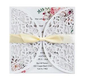 Elegant laser-cut hollow wedding invitation with floral inner card and silk ribbon bow