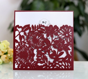 Elegant laser-cut burgundy floral wedding invitation card with pearlescent finish and white insert