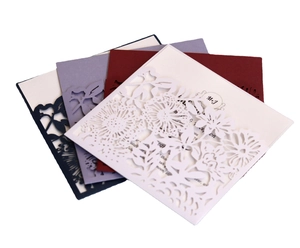 Laser cut floral wedding invitation set in lavender, navy, burgundy, and white colors