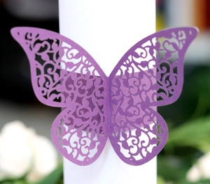 Detailed laser-cut purple butterfly paper napkin ring with intricate vine patterns