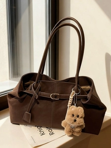 Minimalist large brown tote bag in pebbled PU leather with a cute plush dog charm