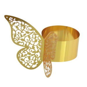 Elegant gold metal napkin ring featuring laser-cut butterfly design with vine patterns