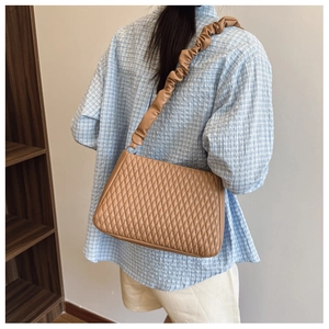 Chic khaki shoulder bag with quilted diamond pattern and ruched leather strap detail