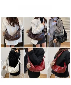 Detailed views of pleated crescent shoulder bags in multiple colors with bear charms