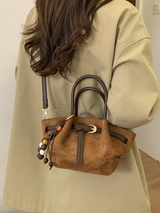 Brown matte suede tote bag with leather handles and decorative beads for women