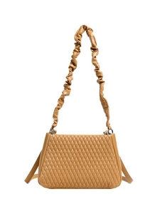 Quilted caramel crossbody bag with pleated strap and versatile diamond stitching