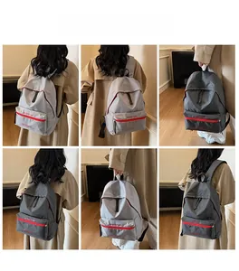 Detailed views of checkered backpacks in grey tones with red zipper contrast