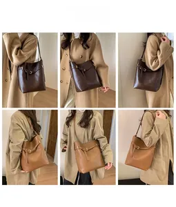 Photos portées du sac seau minimaliste en similicuir marron et camel chic