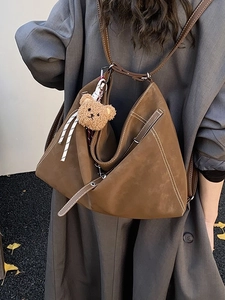 Vintage brown large capacity shoulder bag with contrast stitching and bear charm
