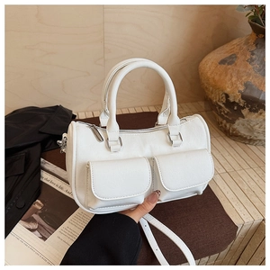 White faux leather crossbody bag detail with twin front pockets and gold hardware