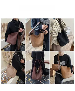 Detail showing oversized suede tote bags with woven shoulder straps in multiple autumn colors