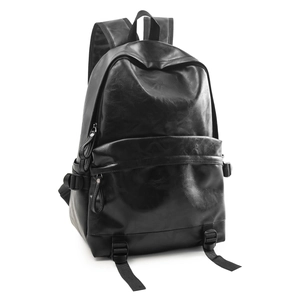 Detail of matte black PU leather backpack showing texture and adjustable straps