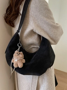 Retro black faux suede hobo bag with adjustable strap and cute plush bear charm decoration