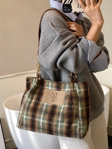 Plaid wool tote bag for women with leather bear patch and metal chain strap in retro style