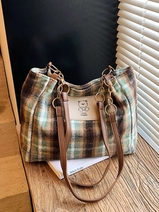 Green plaid woolen tote bag with cartoon bear patch and brown leather straps