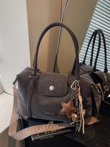 Retro Boston tote bag in dark brown suede with ethnic woven strap and charms