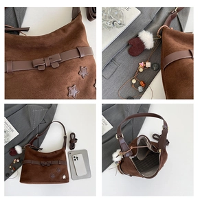 Detailed views of brown suede hobo bag with bow, star patch and striped lining