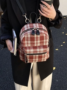Women's red plaid backpack with gold hardware and faux leather straps for autumn style