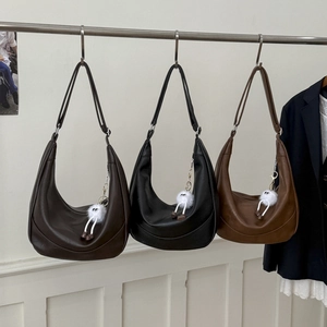 Detailed comparison of hobo bags in dark coffee, classic black, and vintage brown shades