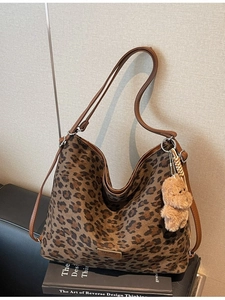 Retro leopard print large tote bag with brown leather straps and teddy bear charm