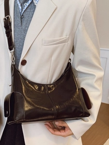 Large dark brown shiny faux leather tote bag for women with side buckle pockets