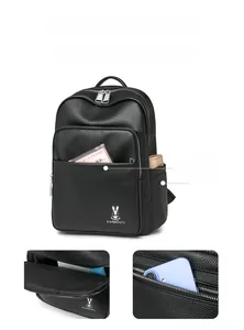Detail of black pebbled leather backpack showing multi-pocket structure and inner storage