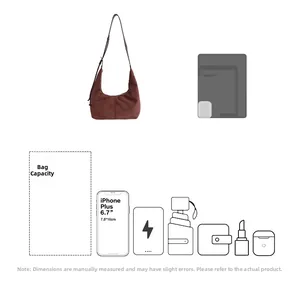 Detailed capacity view of the vintage brown suede hobo bag showing various daily essentials