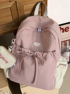 Rosa und cremefarbener Nylon-Rucksack mit Kordelzug-Schleife und kleiner Reißverschlusstasche