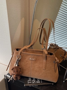Brown vintage faux suede tote bag with drawstring detail and cute bear keychain charm