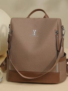 Vintage brown textured leather backpack for women featuring large capacity and a rabbit logo