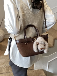Brown vintage suede tote bag with leather straps and a cute plush rabbit pendant charm
