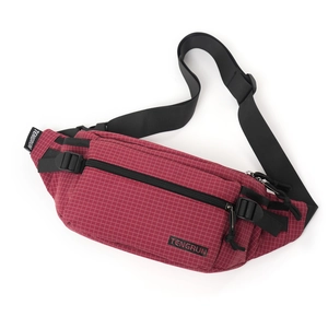 Detail view of red plaid waist bag featuring TENGRUN logo and adjustable nylon strap
