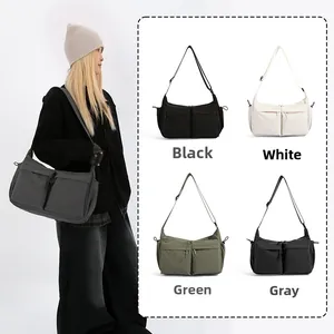 Confronto dettagliato di borse a tracolla multi-tasche in nero, bianco, verde e grigio